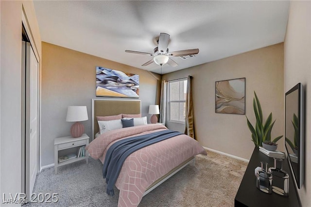 bedroom featuring carpet, baseboards, and a ceiling fan