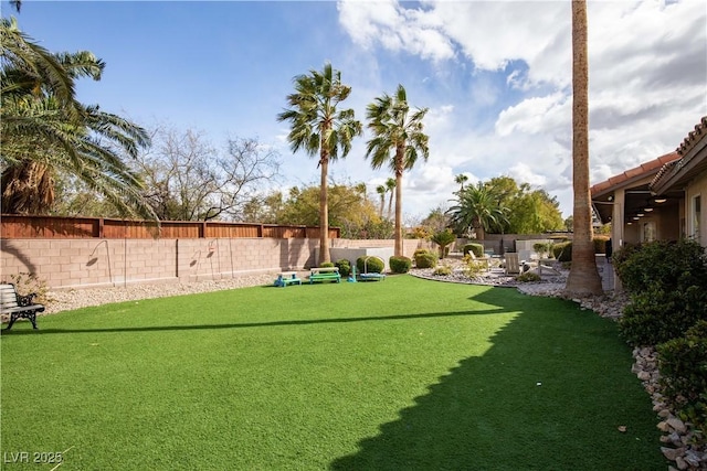 view of yard featuring a fenced backyard