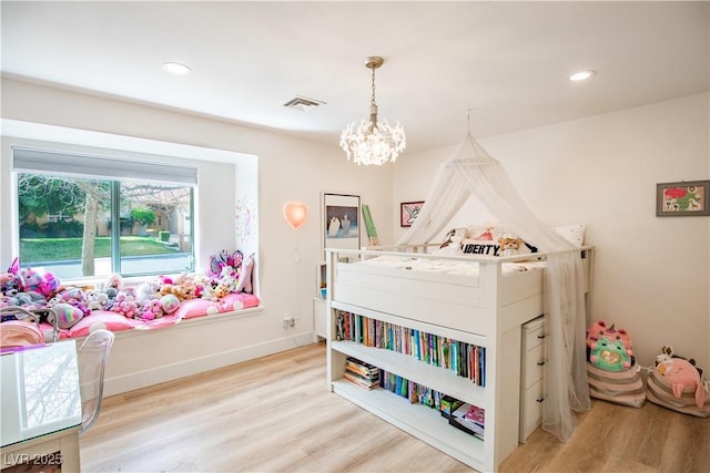 bedroom featuring a chandelier, recessed lighting, visible vents, baseboards, and light wood-type flooring