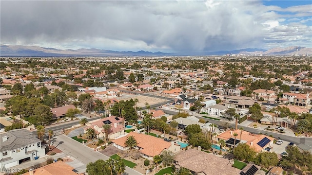 birds eye view of property featuring a residential view and a mountain view