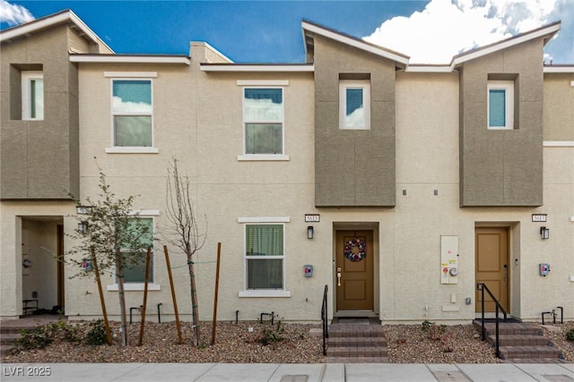 view of property featuring stucco siding