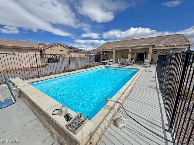 view of pool featuring a fenced in pool, a patio area, and fence