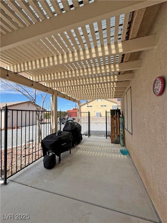 view of patio / terrace featuring a gate