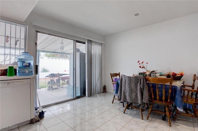 dining space with light tile patterned floors