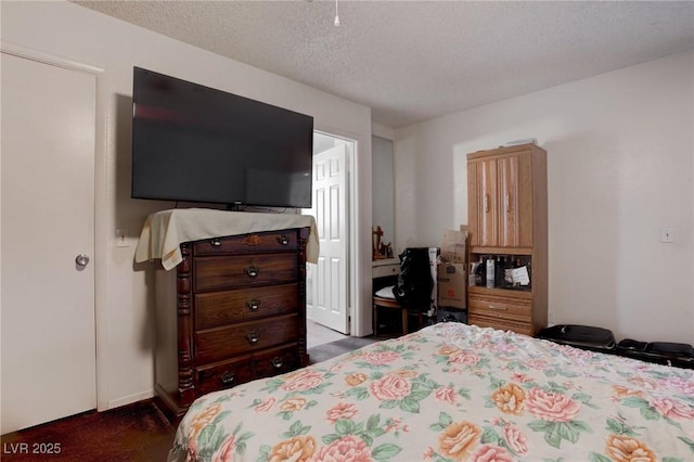 bedroom featuring a textured ceiling