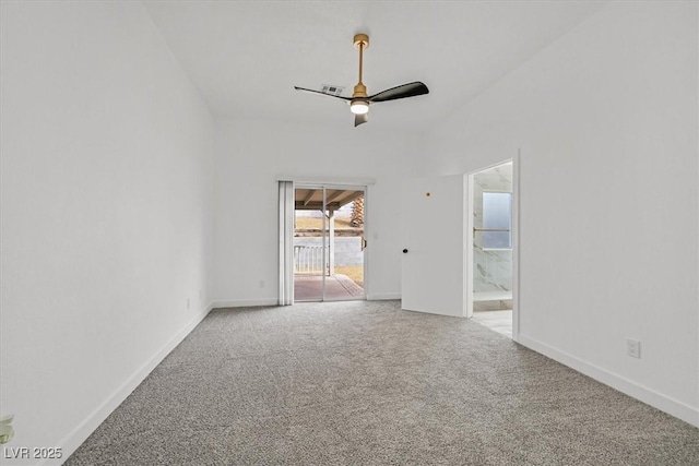 spare room featuring carpet, baseboards, and ceiling fan