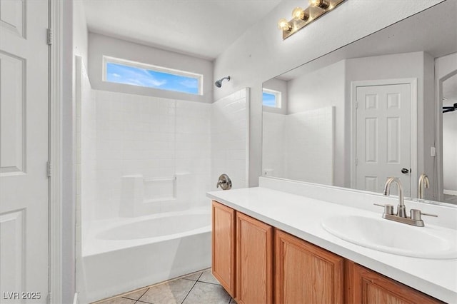 full bathroom with shower / tub combination, vanity, and tile patterned floors