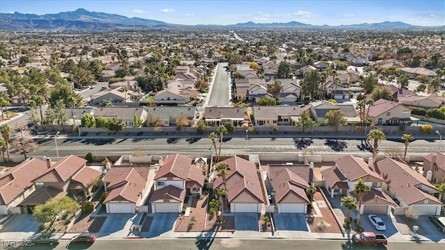 bird's eye view with a residential view and a mountain view