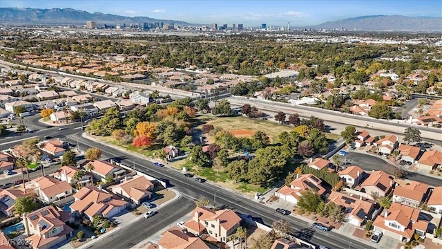 drone / aerial view with a residential view and a mountain view