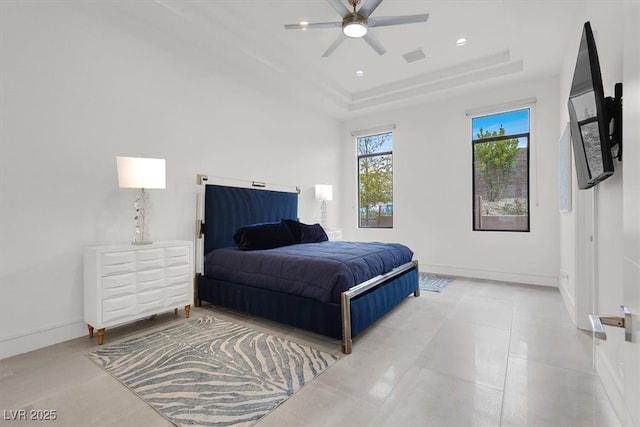 bedroom featuring recessed lighting, a raised ceiling, visible vents, ceiling fan, and baseboards