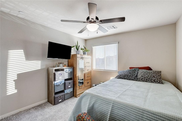 bedroom with visible vents, ceiling fan, baseboards, and carpet