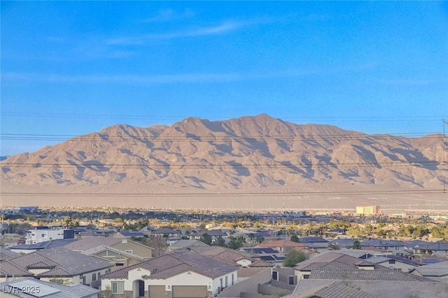 property view of mountains featuring a residential view