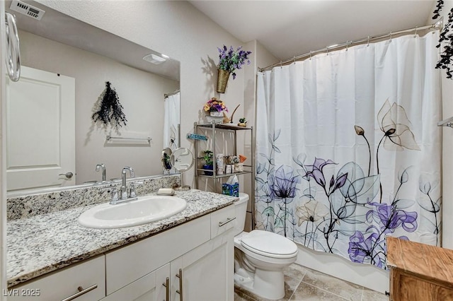 bathroom featuring shower / bath combo with shower curtain, visible vents, toilet, and vanity