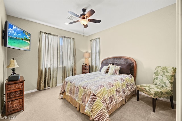 bedroom featuring light carpet, visible vents, a ceiling fan, and baseboards