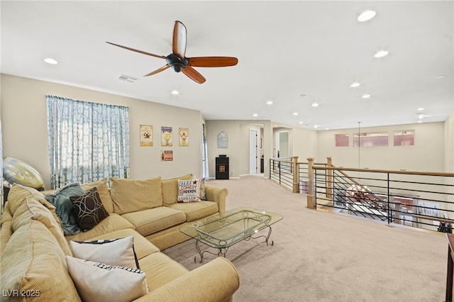 living room with recessed lighting, visible vents, carpet, and ceiling fan