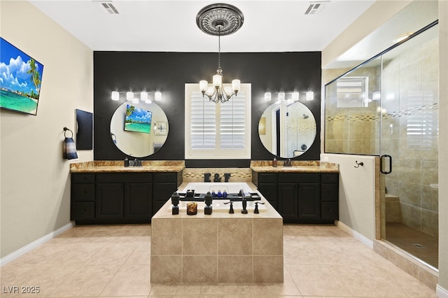 bathroom with tile patterned floors, visible vents, a garden tub, a stall shower, and an inviting chandelier