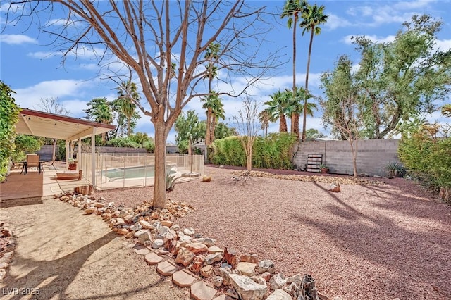 view of yard featuring a fenced backyard and a patio