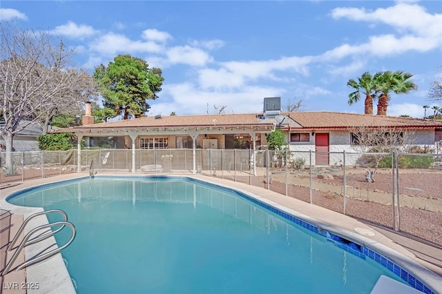 view of swimming pool with fence and a fenced in pool