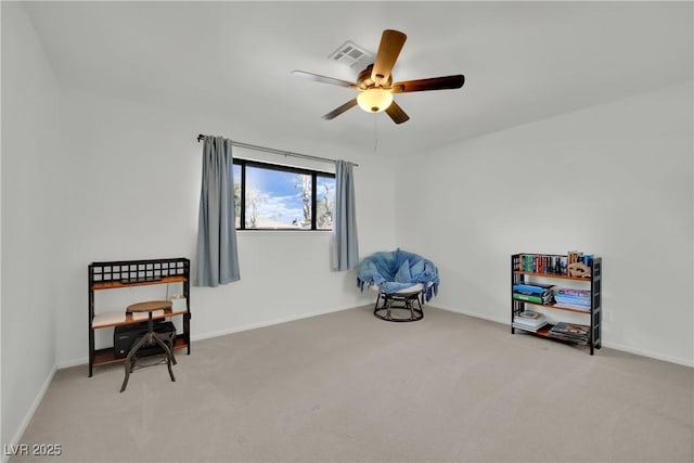 sitting room featuring light carpet, ceiling fan, visible vents, and baseboards