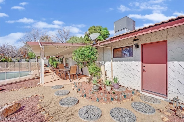 view of patio / terrace with fence