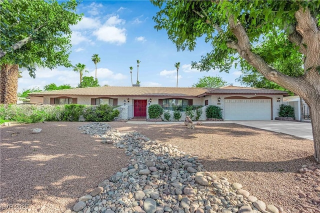 3681 S Rosecrest Cir, Las Vegas, NV 89121 - single story home with stucco siding, concrete driveway, a garage, and a tile roof