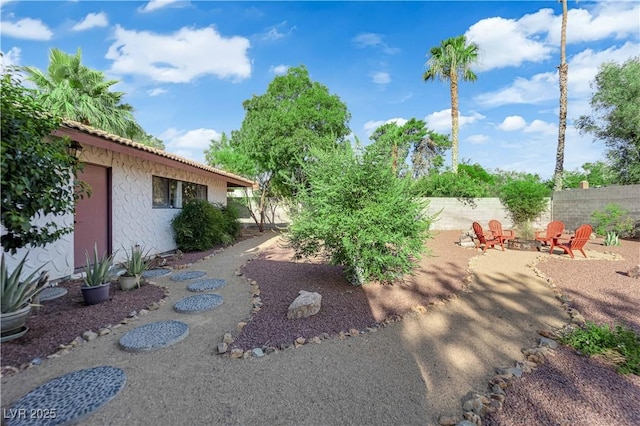 3681 S Rosecrest Cir, Las Vegas, NV 89121 - fenced backyard with a fire pit