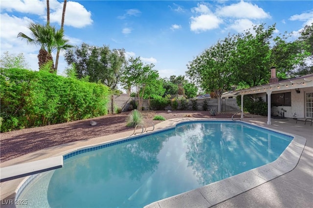 3681 S Rosecrest Cir, Las Vegas, NV 89121 - view of pool with a fenced backyard, a patio, and a diving board