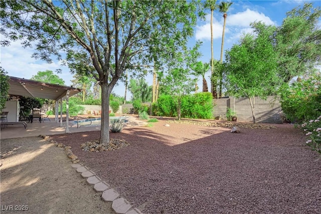 3681 S Rosecrest Cir, Las Vegas, NV 89121 - fenced backyard featuring a patio area