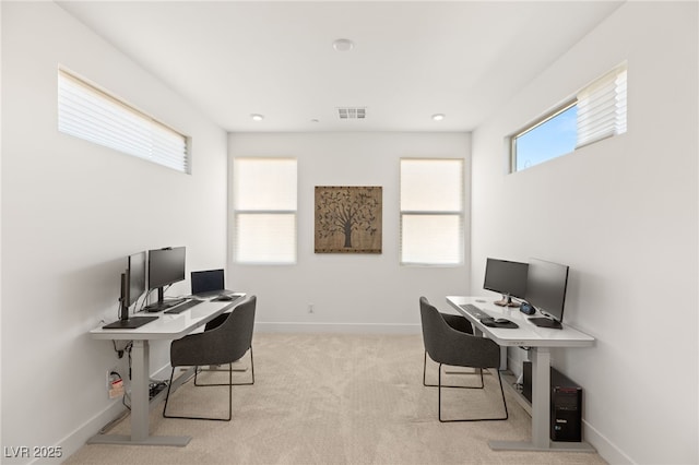 home office with carpet flooring, visible vents, and baseboards