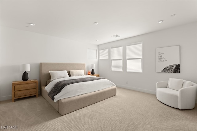 carpeted bedroom with recessed lighting, visible vents, and baseboards