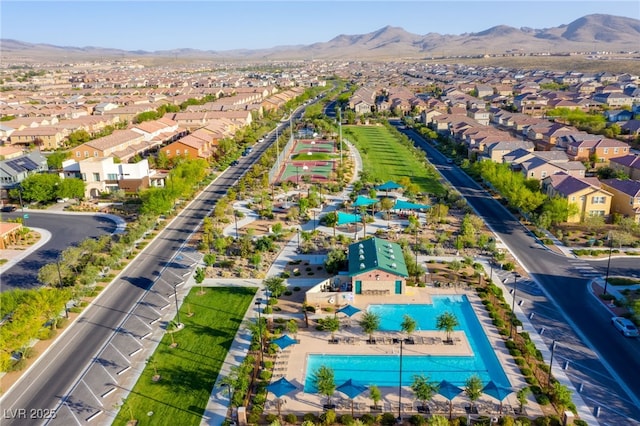 drone / aerial view with a residential view and a mountain view