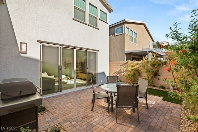 view of patio / terrace with fence and outdoor dining area