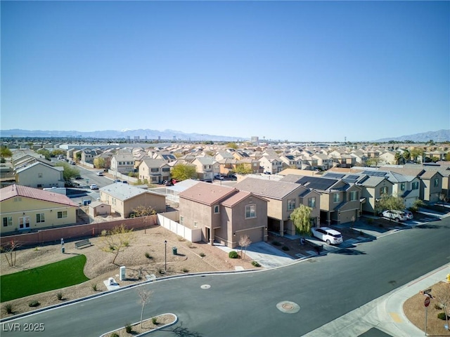 birds eye view of property featuring a residential view and a mountain view