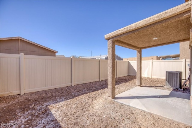 view of patio featuring a fenced backyard and central AC unit