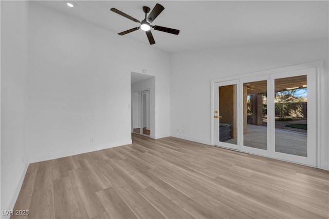 empty room with baseboards, ceiling fan, light wood-style floors, high vaulted ceiling, and recessed lighting