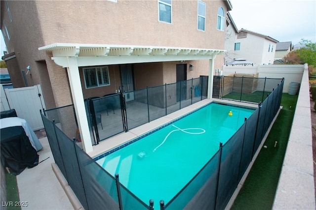 view of pool with a fenced in pool, a patio area, a fenced backyard, and a pergola