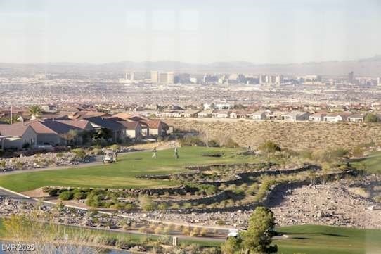 birds eye view of property with a residential view and golf course view