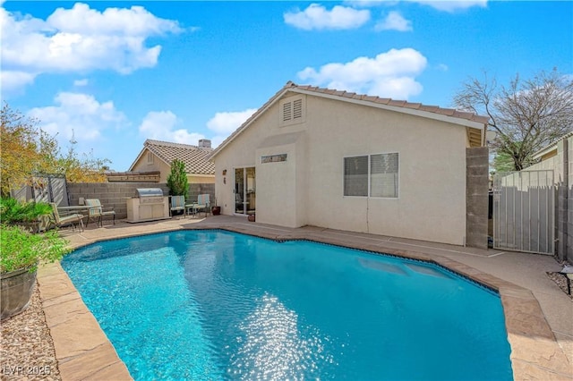 view of pool with a patio area, a fenced backyard, and a fenced in pool