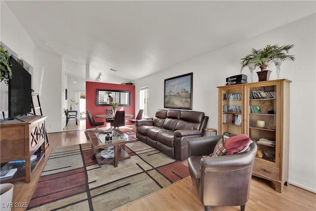 living area featuring light wood-style floors