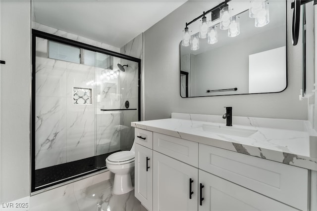 full bathroom with a marble finish shower, marble finish floor, vanity, and toilet