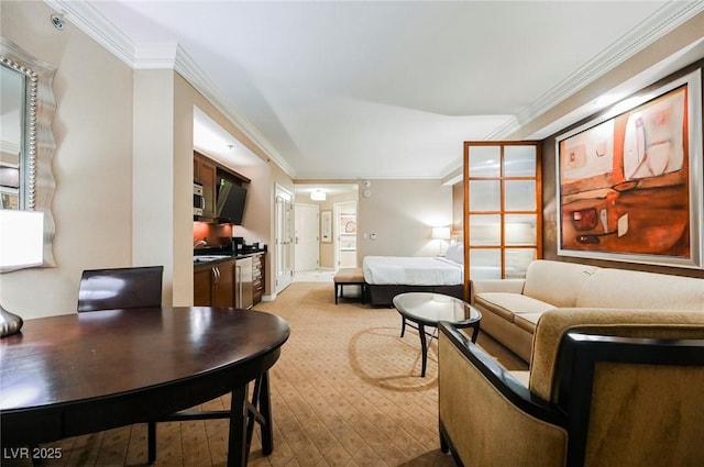 living area featuring ornamental molding