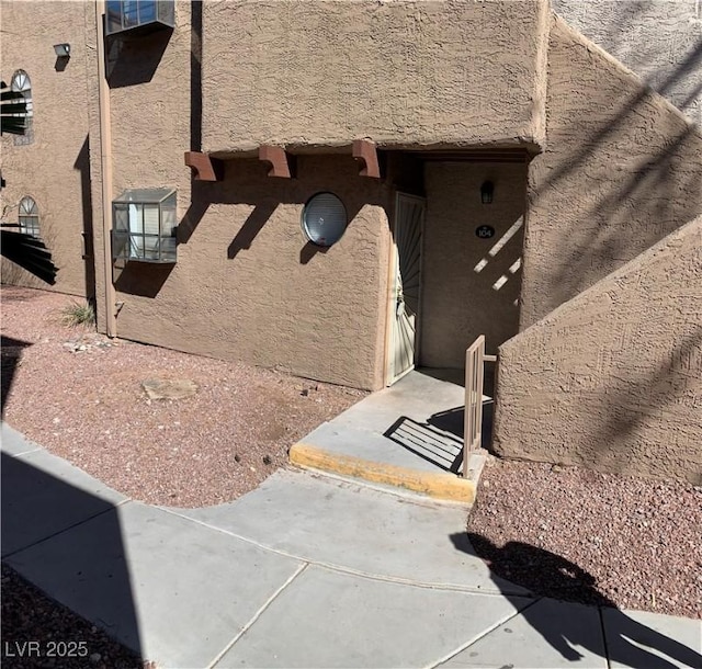 exterior details featuring stucco siding