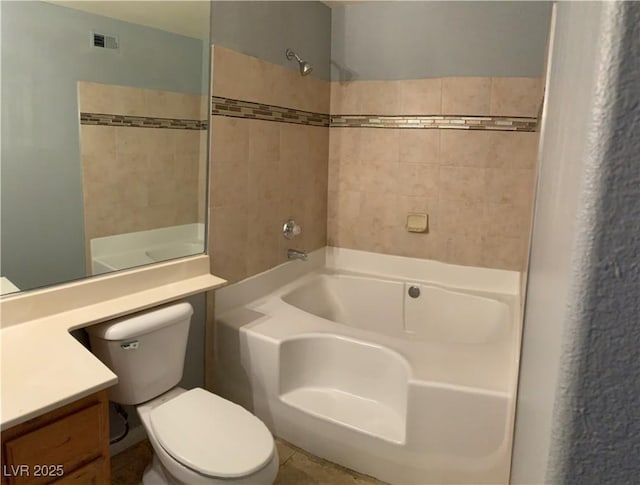 full bathroom with toilet, vanity, visible vents, and tile walls