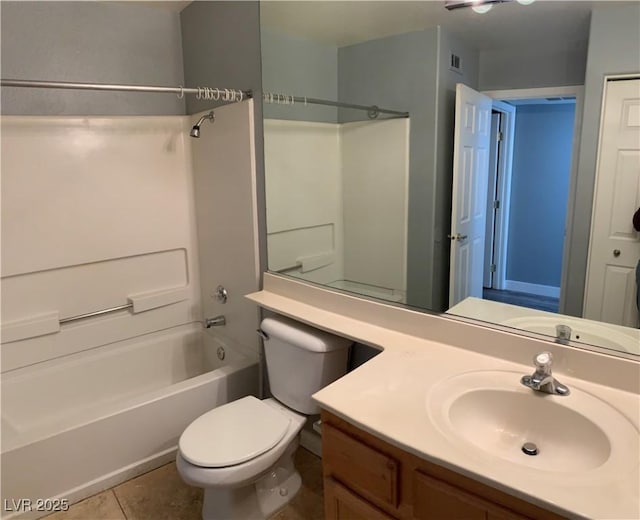 full bathroom with shower / washtub combination, visible vents, toilet, vanity, and tile patterned floors