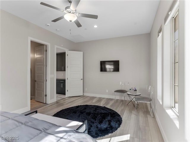 bedroom featuring recessed lighting, baseboards, light wood-style flooring, and a ceiling fan