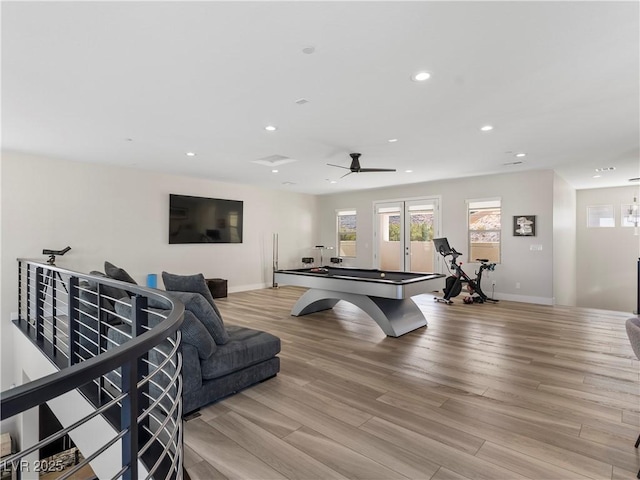 recreation room with recessed lighting, light wood-type flooring, french doors, and baseboards