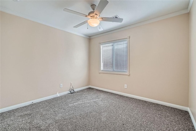 unfurnished room featuring ceiling fan, carpet floors, ornamental molding, and baseboards