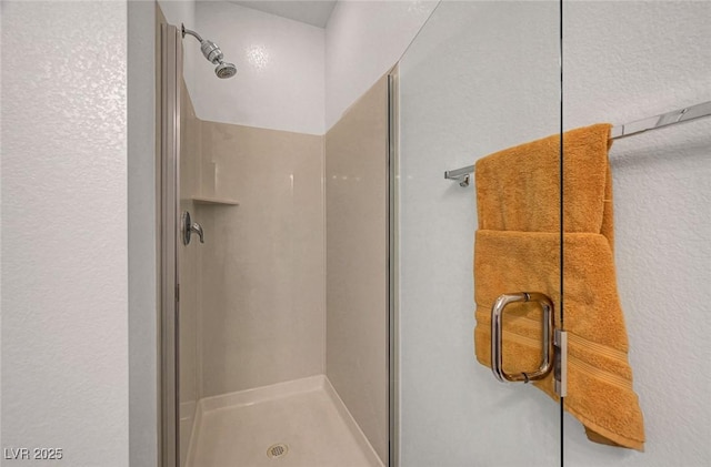 full bathroom featuring a stall shower