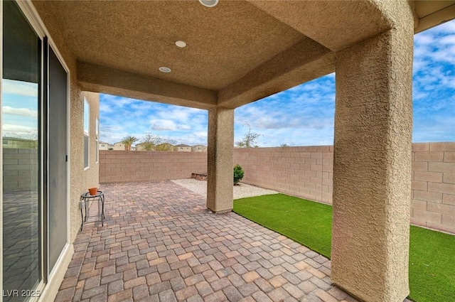 view of patio featuring a fenced backyard