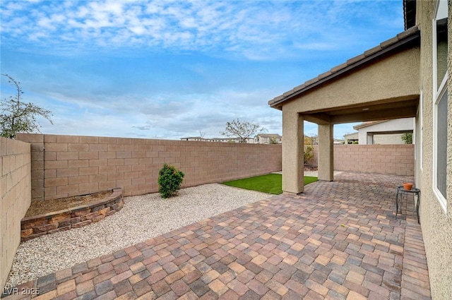 view of patio featuring a fenced backyard